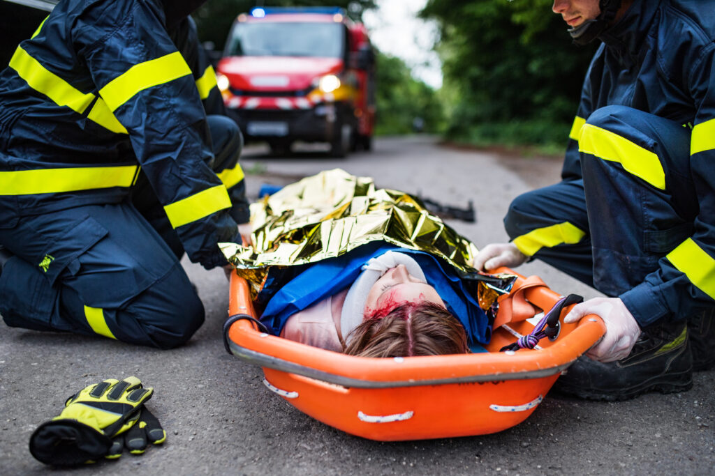 Motorcycle accident victim being attended to