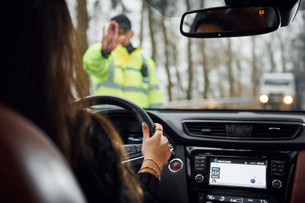 Police officer stops vehicle driving the wrong way